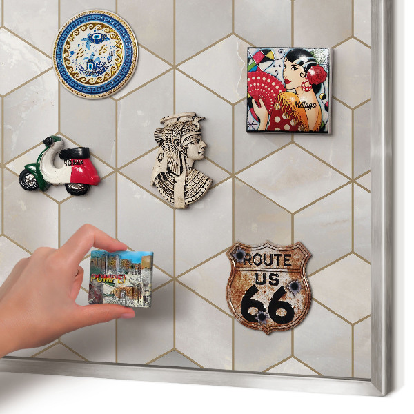 Souvenir magnet display board with a silver frame Cubic background