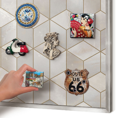 Souvenir magnet display board with a silver frame Cubic background