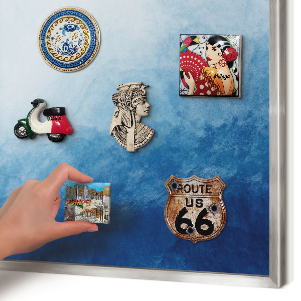 Souvenir magnet display board with a silver frame Blue abstractions