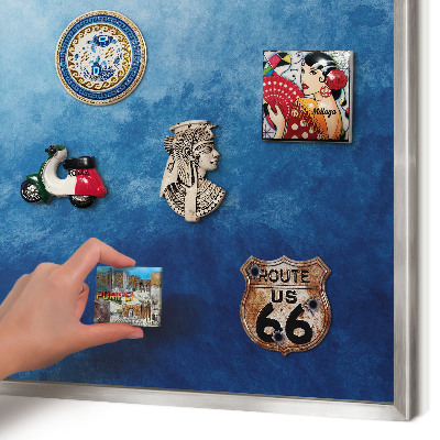 Souvenir magnet display board with a silver frame Blue abstractions