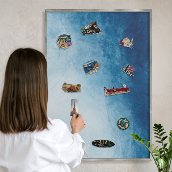 Souvenir magnet display board with a silver frame Blue abstractions