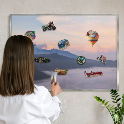 Souvenir magnet display board with a silver frame Sky Journey