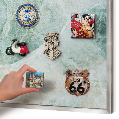 Souvenir magnet display board with a silver frame Green textures