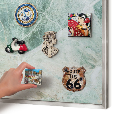 Souvenir magnet display board with a silver frame Green textures