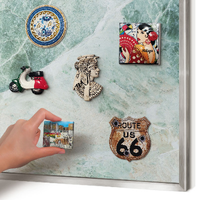 Souvenir magnet display board with a silver frame Green textures
