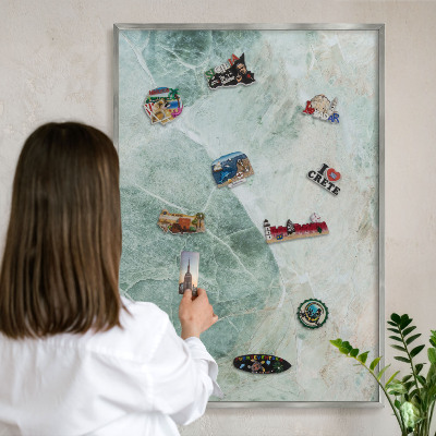 Souvenir magnet display board with a silver frame Green textures