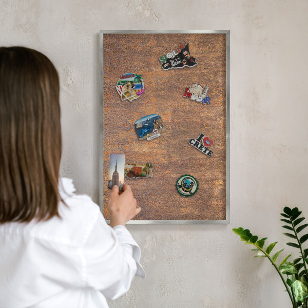 Souvenir magnet display board with a silver frame Rusty elegance