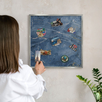 Souvenir magnet display board with a silver frame Marble elegance
