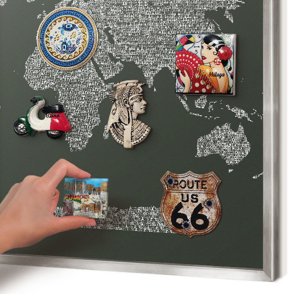 Souvenir magnet display board with a silver frame Text map