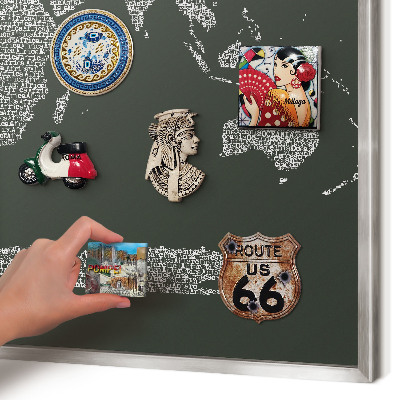 Souvenir magnet display board with a silver frame Text map