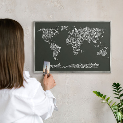 Souvenir magnet display board with a silver frame Text map