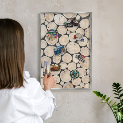 Souvenir magnet display board with a silver frame Wooden texture