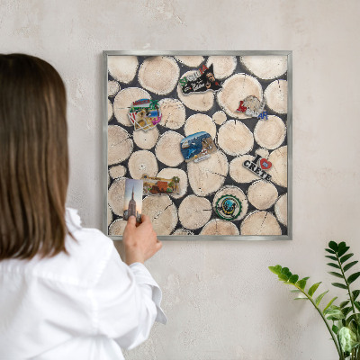 Souvenir magnet display board with a silver frame Wooden texture
