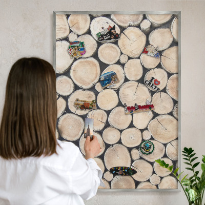 Souvenir magnet display board with a silver frame Wooden texture