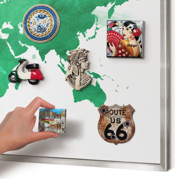 Souvenir magnet display board with a silver frame Green map