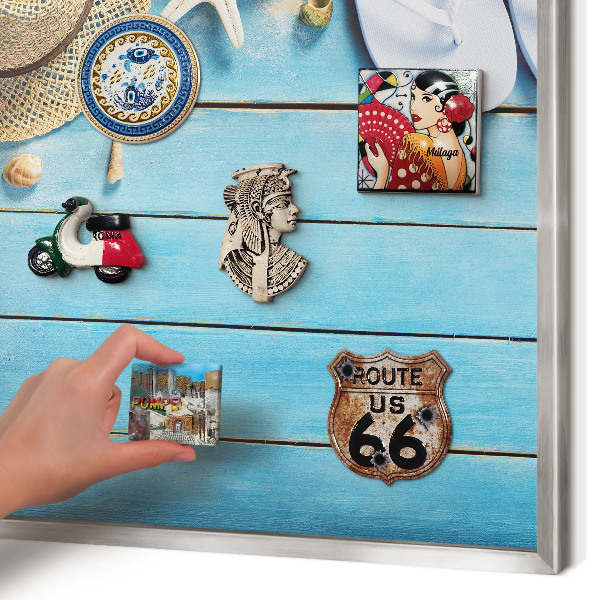 Souvenir magnet display board with a silver frame Holiday atmosphere
