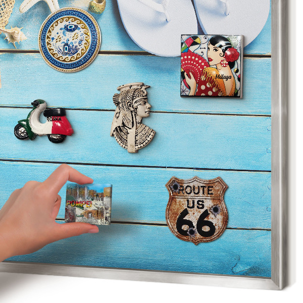 Souvenir magnet display board with a silver frame Holiday atmosphere