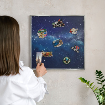 Souvenir magnet display board with a silver frame Star space