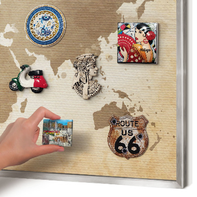 Souvenir magnet display board with a silver frame World map