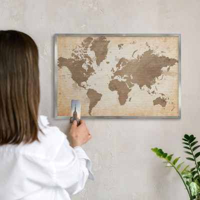 Souvenir magnet display board with a silver frame World map