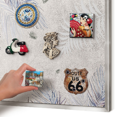 Souvenir magnet display board with a silver frame Leafy elegance
