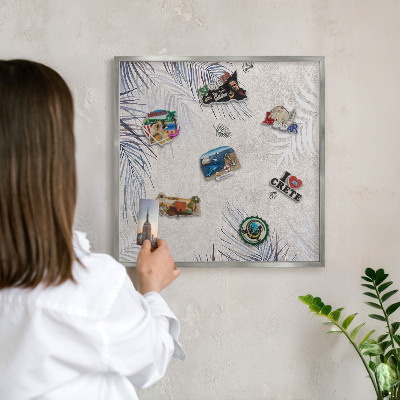 Souvenir magnet display board with a silver frame Leafy elegance
