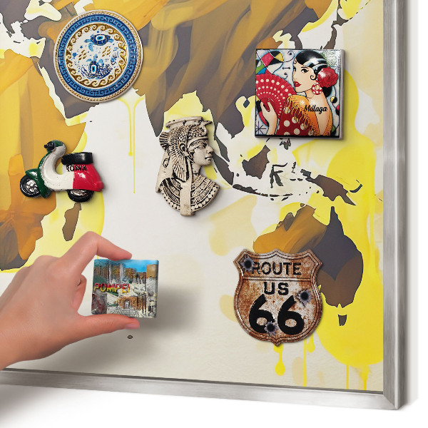 Souvenir magnet display board with a silver frame World map