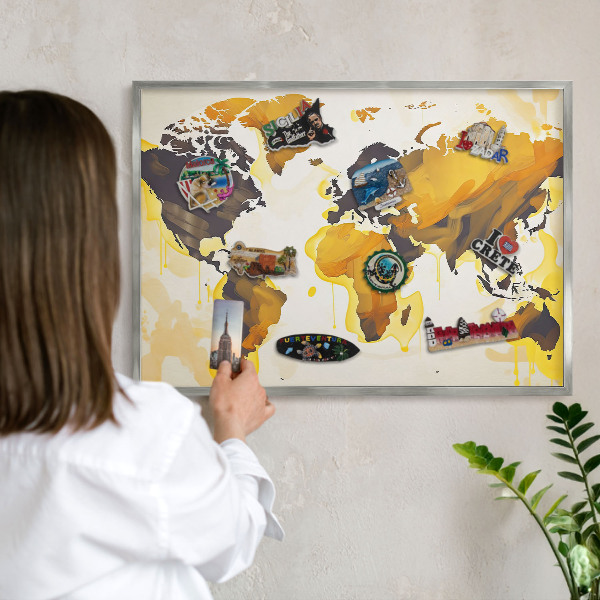 Souvenir magnet display board with a silver frame World map