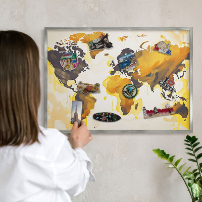 Souvenir magnet display board with a silver frame World map