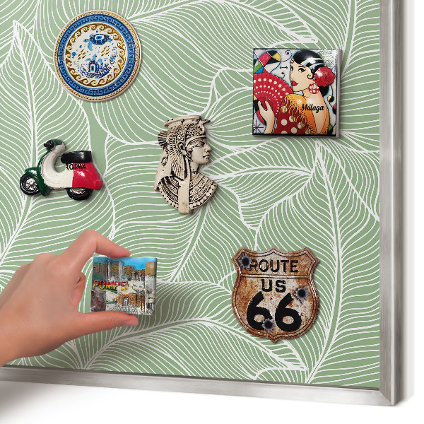 Souvenir magnet display board with a silver frame Tropical leaves