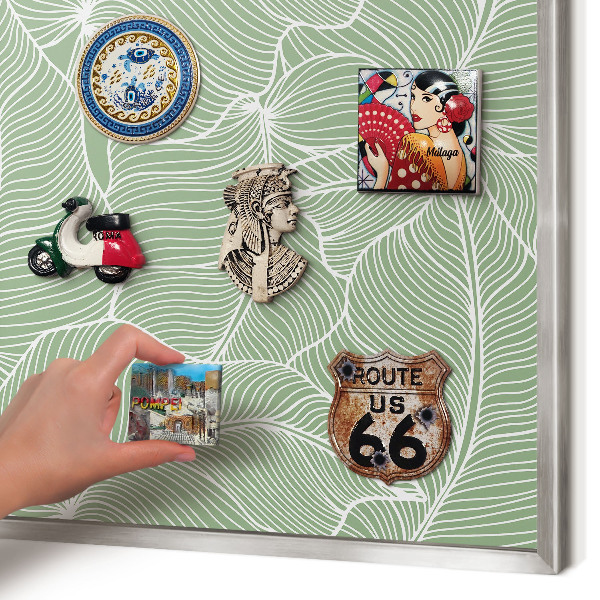 Souvenir magnet display board with a silver frame Tropical leaves