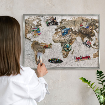 Souvenir magnet display board with a silver frame Relief map