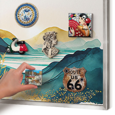 Souvenir magnet display board with a silver frame A peaceful view