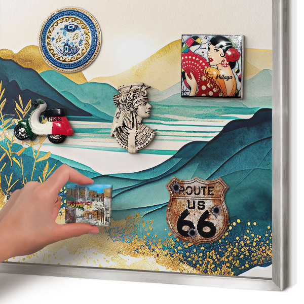 Souvenir magnet display board with a silver frame A peaceful view