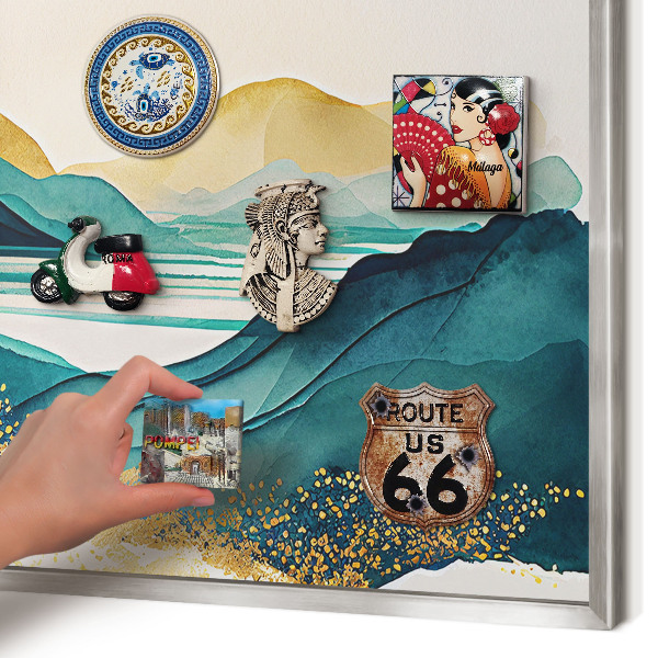 Souvenir magnet display board with a silver frame A peaceful view