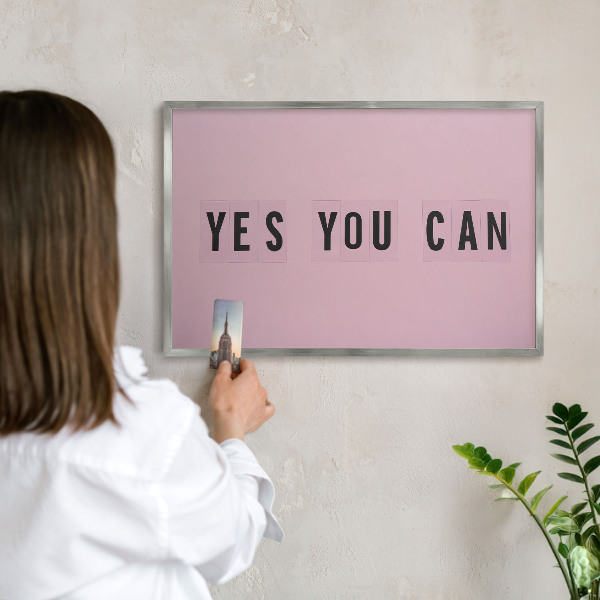 Souvenir magnet display board with a silver frame Motivation every day