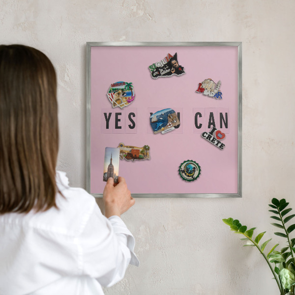 Souvenir magnet display board with a silver frame Motivation every day