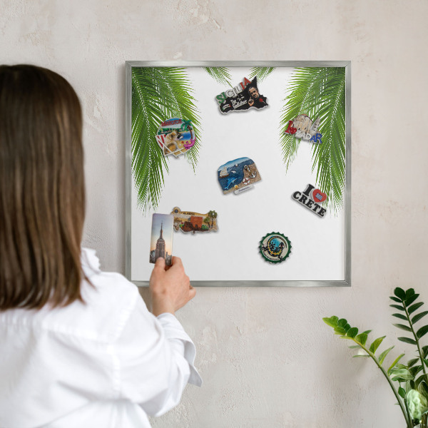 Souvenir magnet display board with a silver frame Exotic nature
