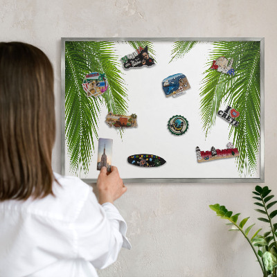 Souvenir magnet display board with a silver frame Exotic nature