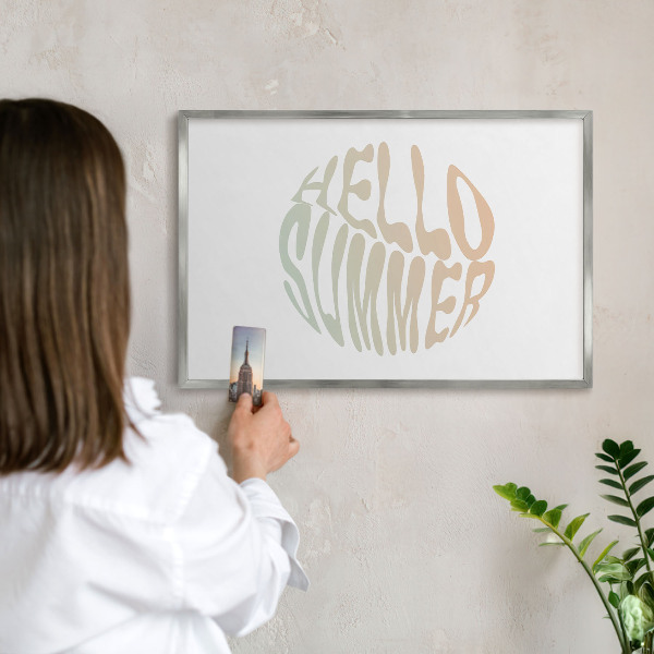 Souvenir magnet display board with a silver frame Hello summer