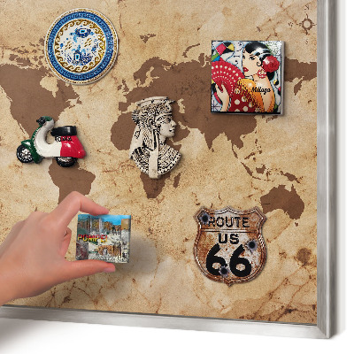 Souvenir magnet display board with a silver frame World map