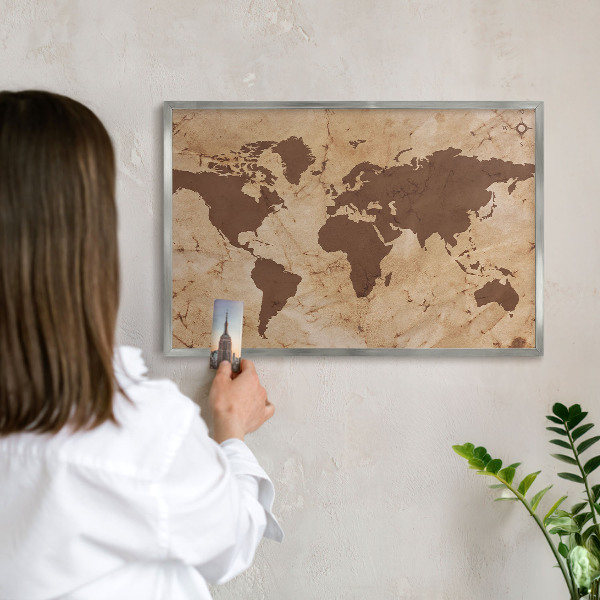 Souvenir magnet display board with a silver frame World map