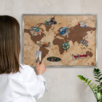 Souvenir magnet display board with a silver frame World map