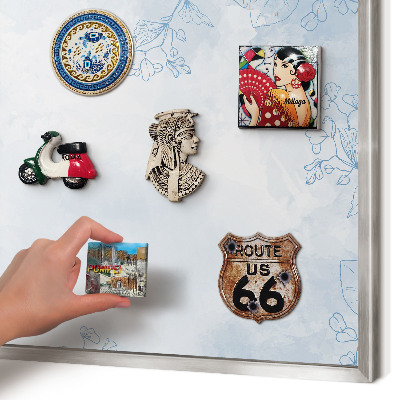 Souvenir magnet display board with a silver frame Floristic elegance