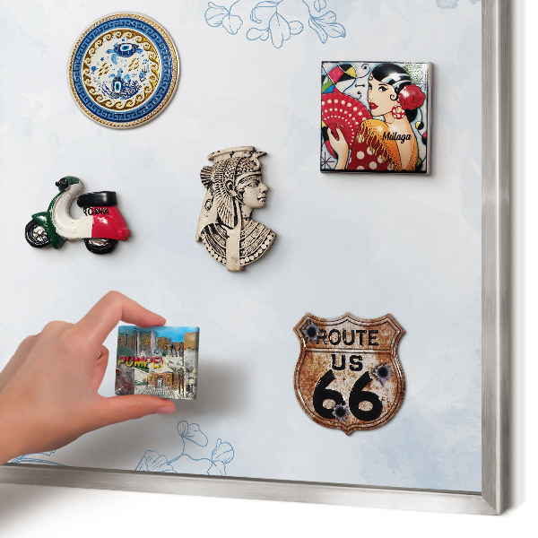Souvenir magnet display board with a silver frame Floristic elegance