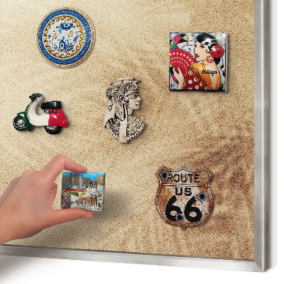 Souvenir magnet display board with a silver frame Sand leaves