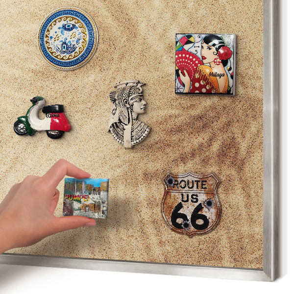 Souvenir magnet display board with a silver frame Sand leaves