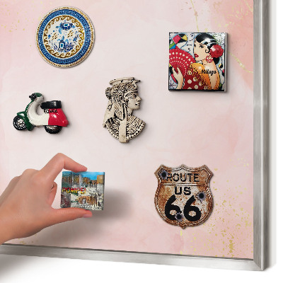 Souvenir magnet display board with a silver frame Subtle elegance