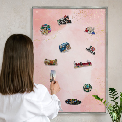 Souvenir magnet display board with a silver frame Subtle elegance