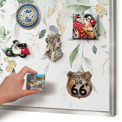 Souvenir magnet display board with a silver frame Green leaves